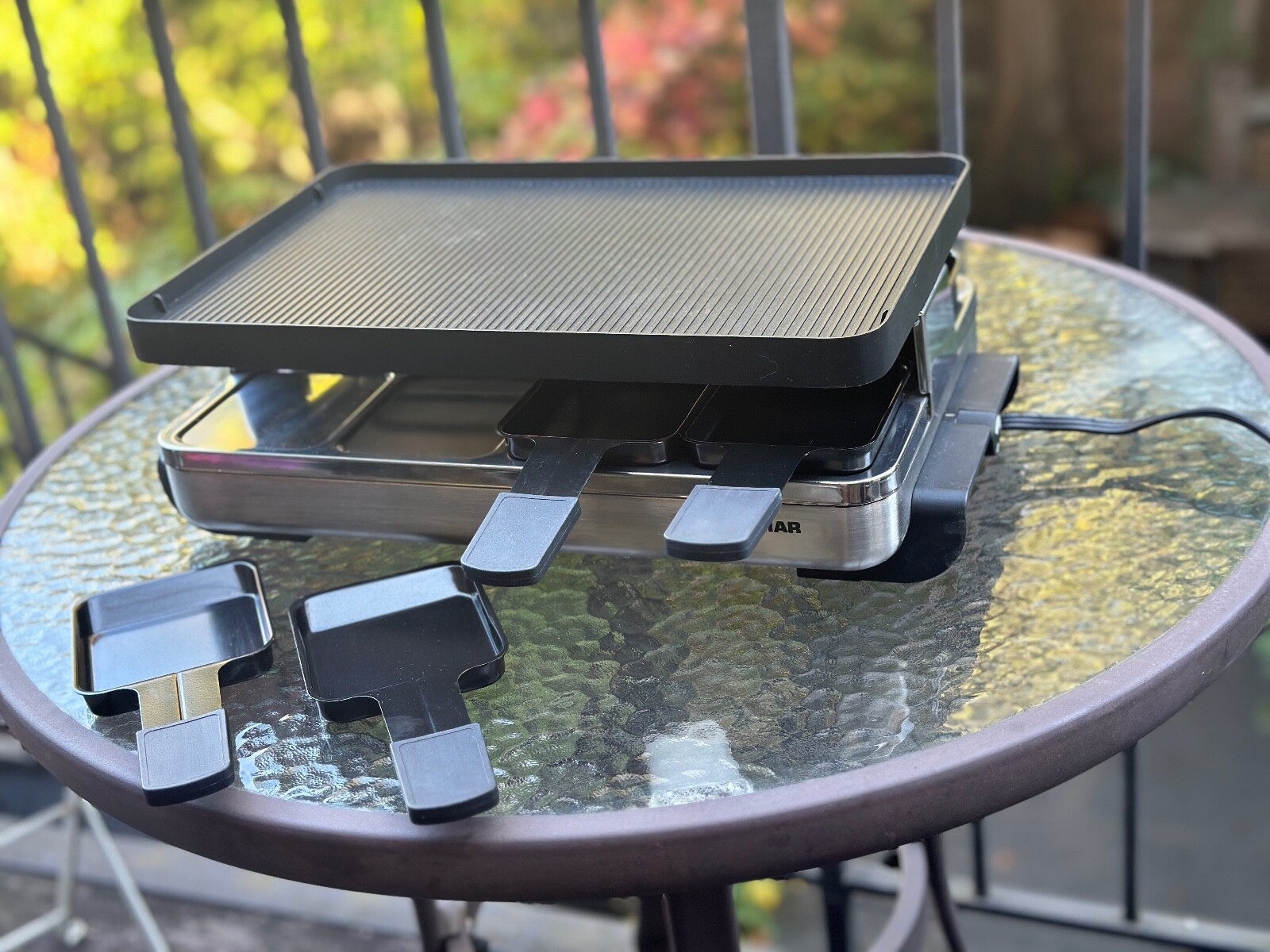 Swissmar 8-person raclette party grill with reversible cast aluminum.