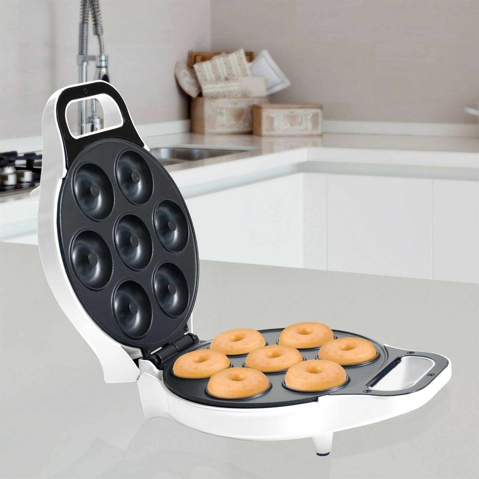 Electric Mini Donut Maker 7 Two-Inch Donuts Non Stick, No Oil or Frying 4 Min.