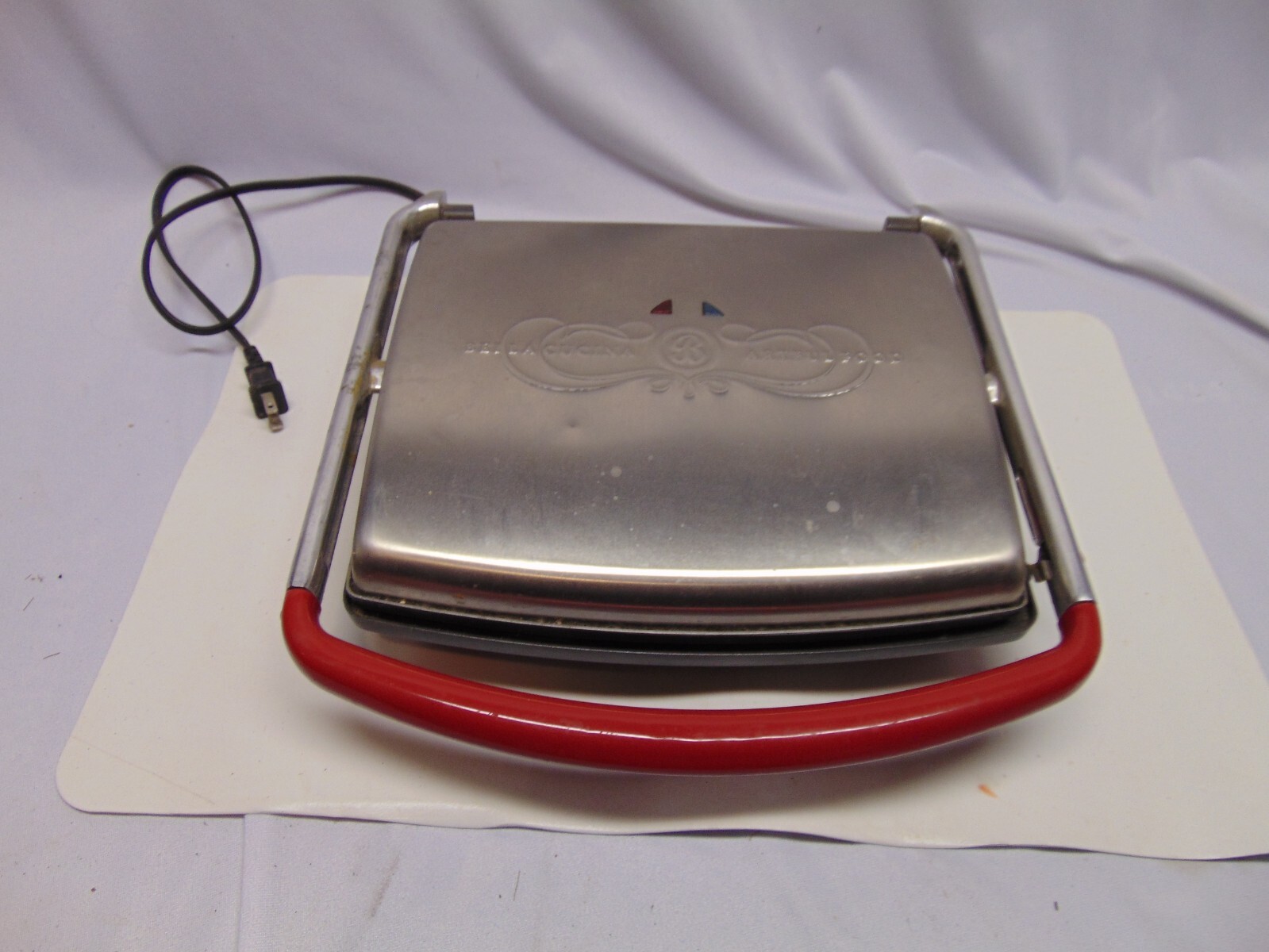 Bella Cucina Panini Grill with red handle #13002 1400W 12″ x 10 grilling surface
