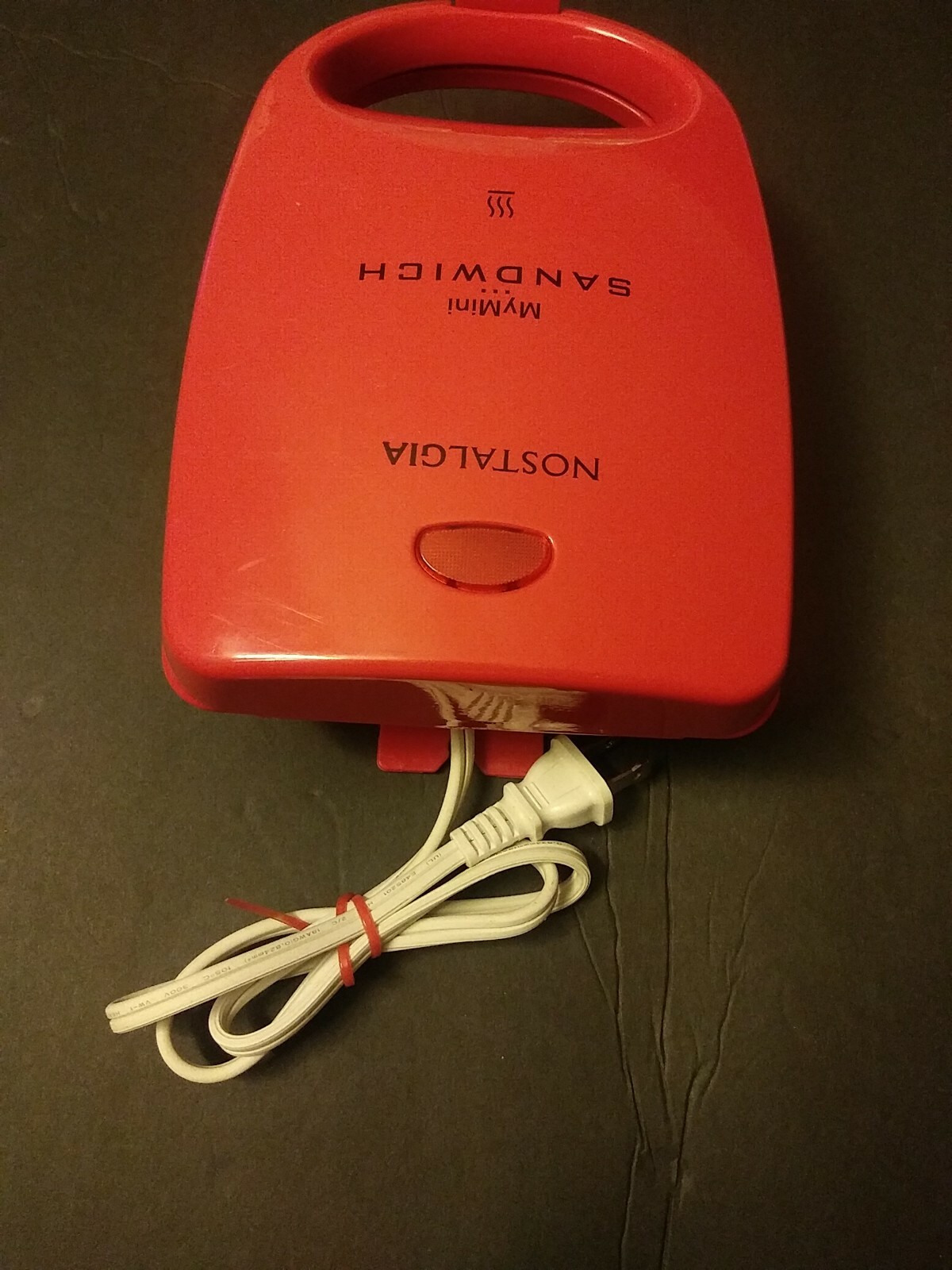 Nostalgia My mini Sandwich Maker, Red model # MSNDW5RD 120V AC/60HZ never used.