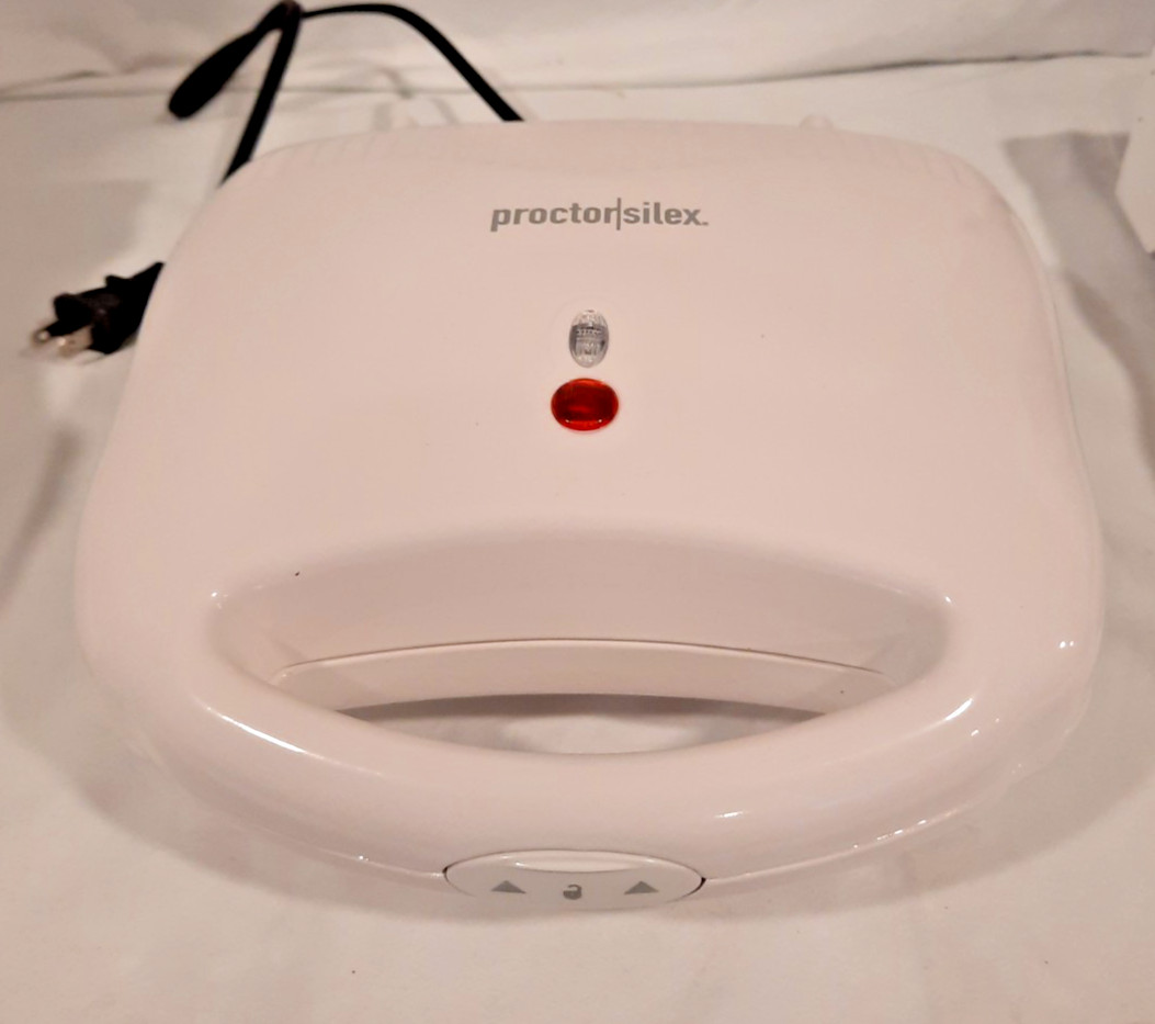 PROCTOR SILEX SANDWICH TOASTER NONSTICK SURFACES. STORES UPRIGHT. NOT USED
