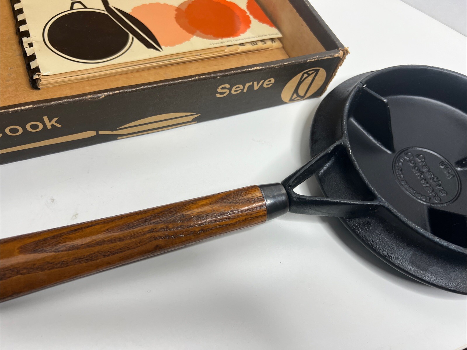 Vintage CREPE GRIDDLE by CREATIVE COOKWARE. CAST IRON, WOOD HANDLE. MADE IN USA