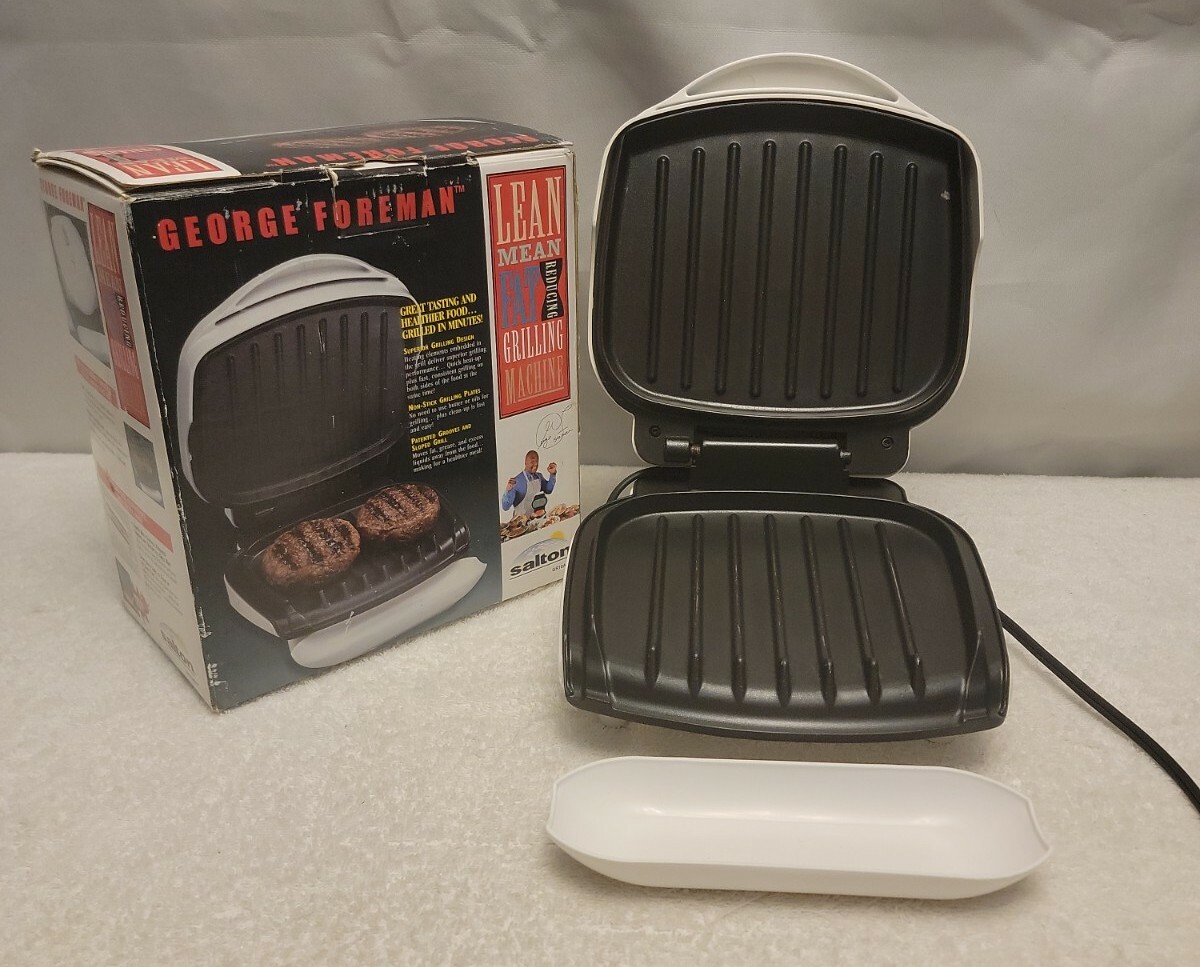 GEORGE FOREMAN GRILLING MACHINE, MODEL GR10AWHT LEAN MEAN FAT REDUCING MACHINE!